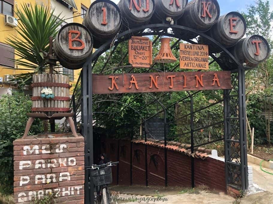 street entrance with large overhead sign of Kantina Binjaket