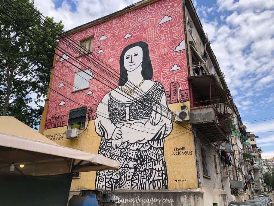 mural of woman on building in Tirana, where the street art is one of the best things to do in Albania