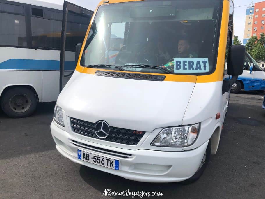Berat mini bus at North South Bus Station in Tirana, Albania - taking local transit is a great travel tip 