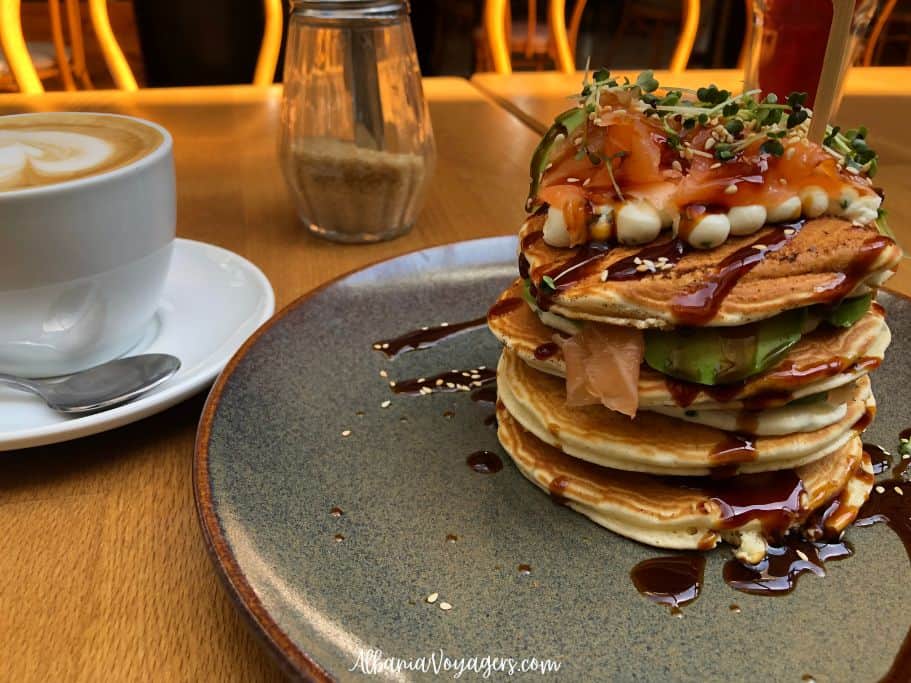 stack of fanc pancaked with salmon and cream cheese at TeDeKtu, one of Tirana's best spots to eat brunch