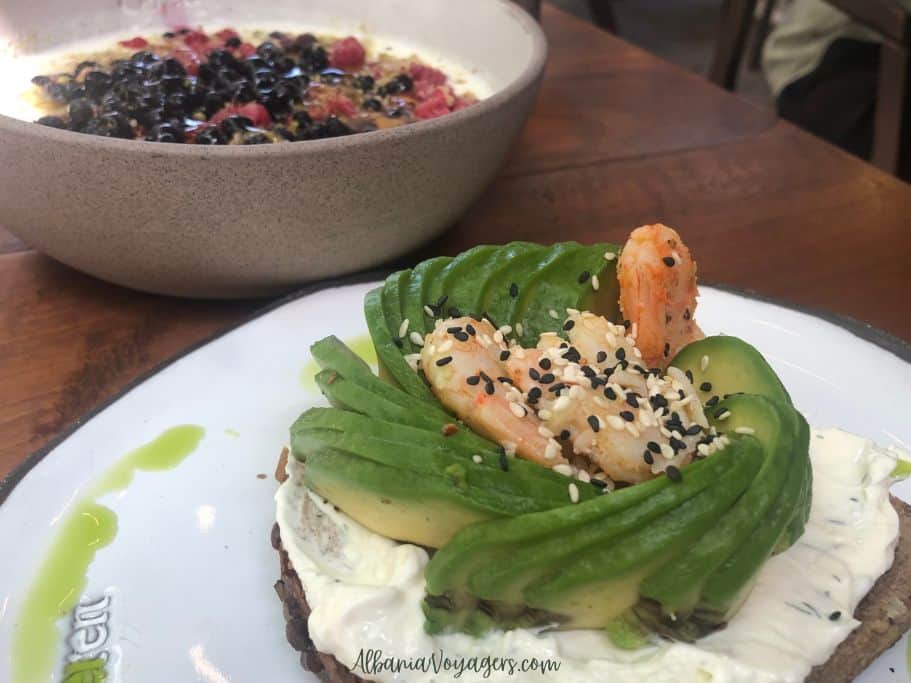 shrimp and avocado no toast and big blow of bluberry topped yogurt at In's Myslym Shyri, Tirana