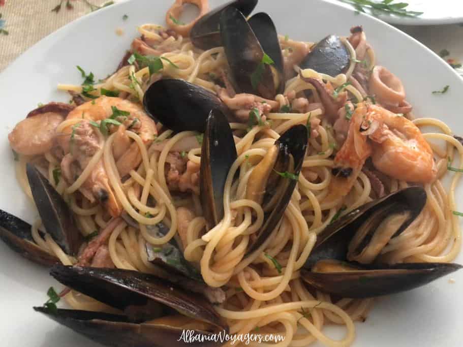 white plate of seafood spagetti with shimp and mussels at Bar Rosticeri Gazi in Durres