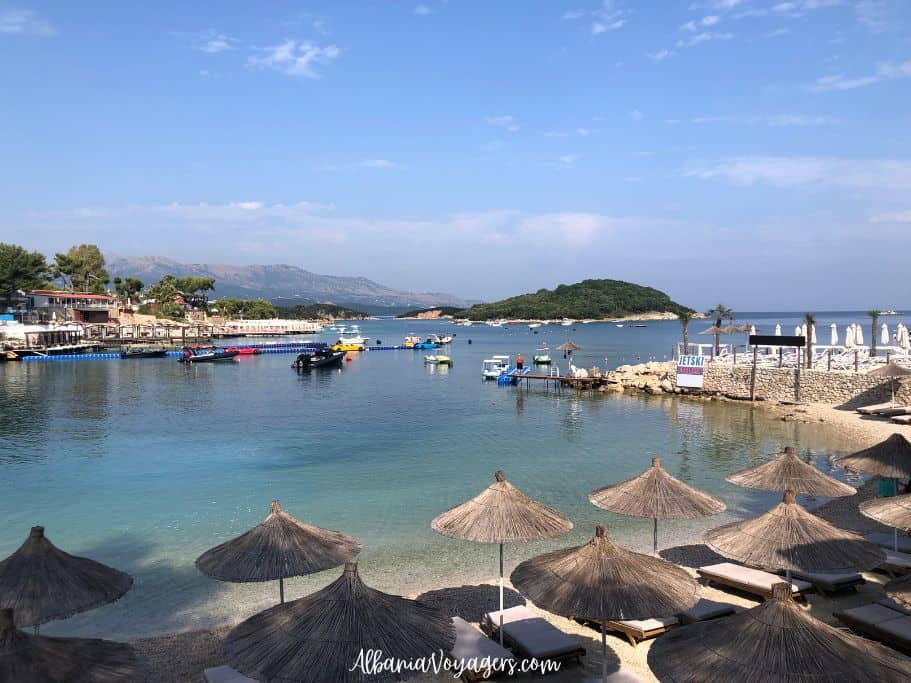 Mango beach with sunbeds and views of Ksamil Island