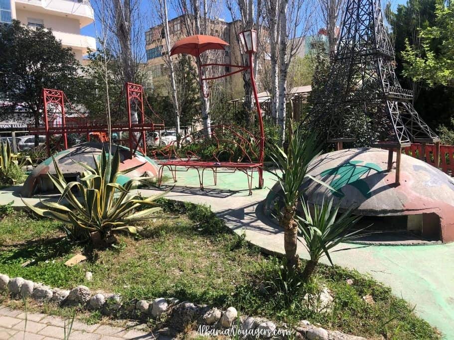 two painted bunkers in a children's park in Vlore - a good travel tip is to know these bunkers are all over Albania