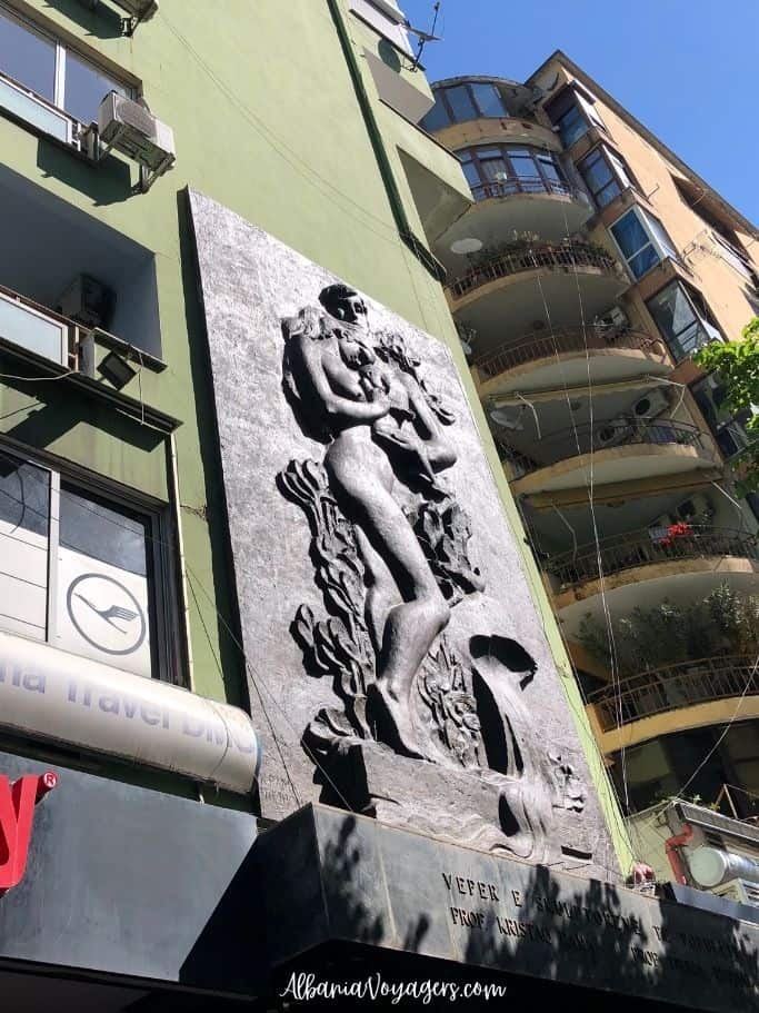 Communist era apartment building with artistic relief