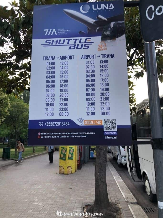 sign for hte Tirana Airport shuttle bus in Tirana with timetable