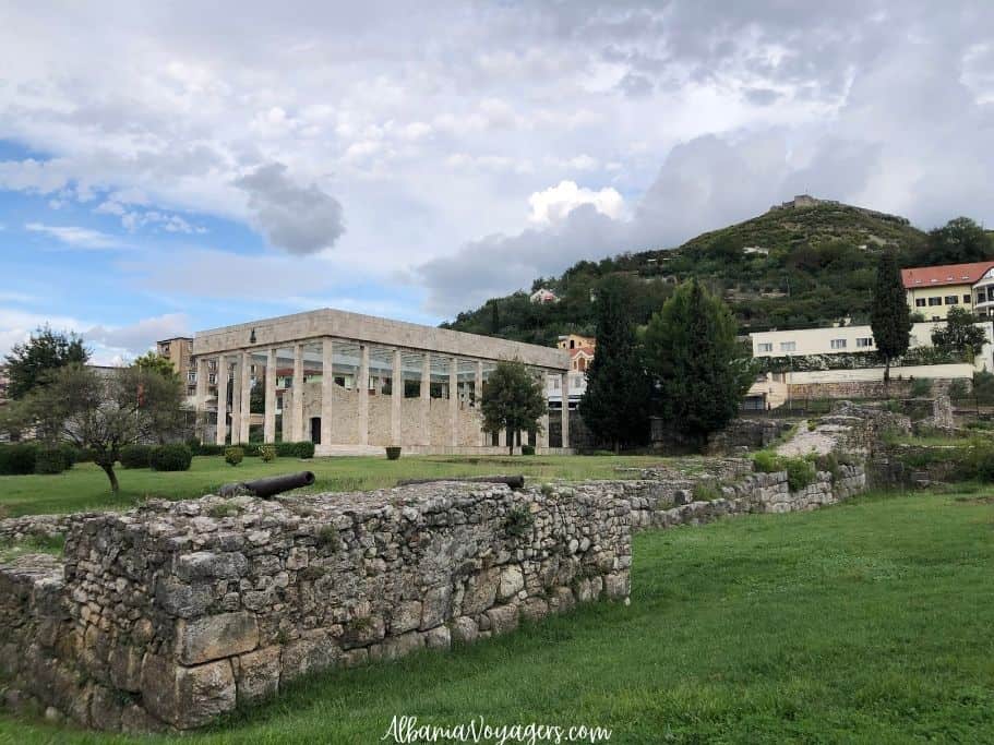 view of Skanderbeg tomb with surrounding ruins and grass in Lezhe