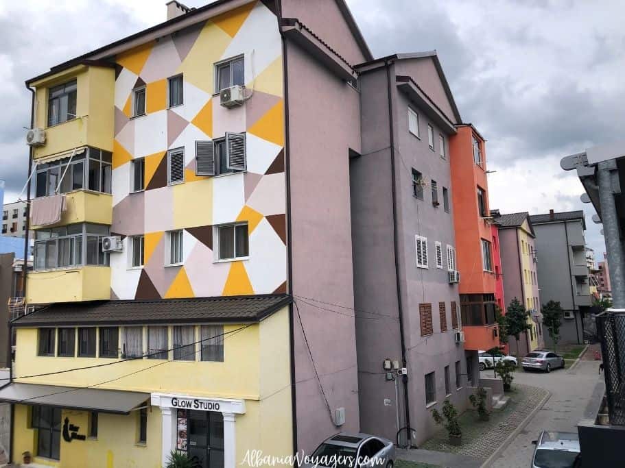 Apartment buildings in Lezhe painted in bright colours and geometric designs