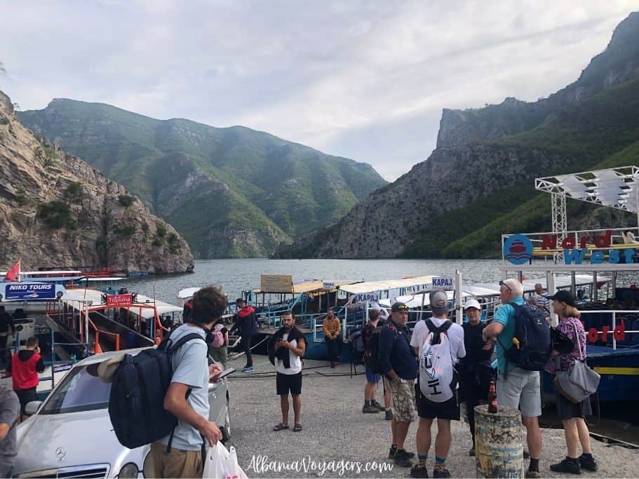 lots of people and boats at Komani Lake boat launch