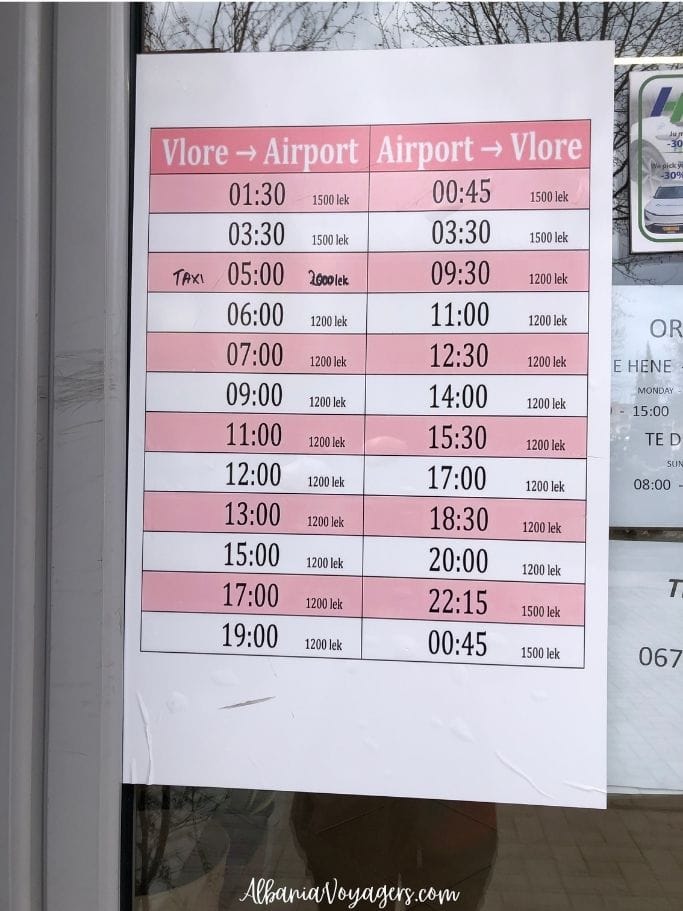 photo of the airport shuttle schedule from the door of the Hermes office in Vlore