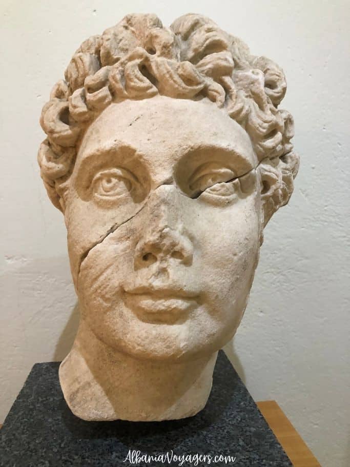 white stone sculpture of a head at Apollonia