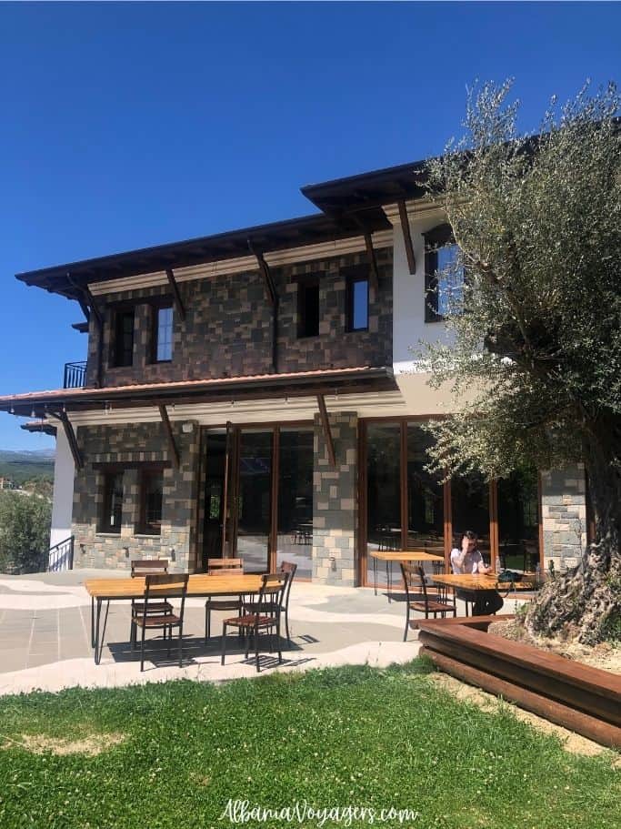 Traditional stone building and terrace at Pupa Winery near Berat
