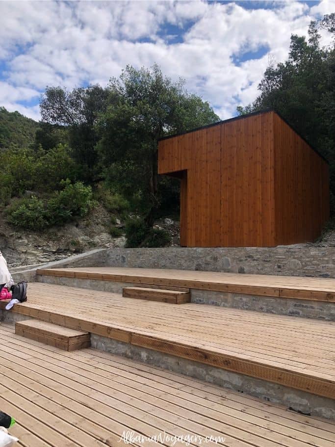wooden change room and decking at Benja Hot Springs in Albania