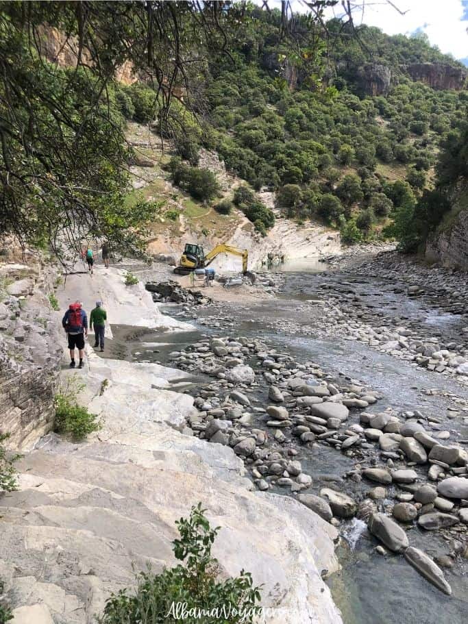 hikers on river bed at Langarica Canyon