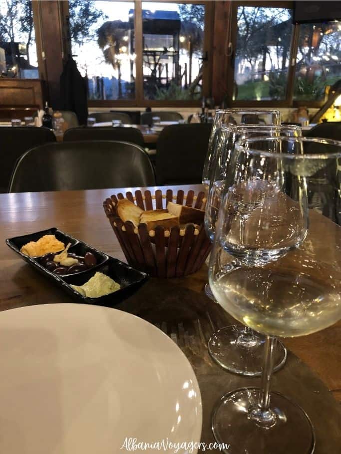 several glasses of wine on table with meze at Abaia Winery