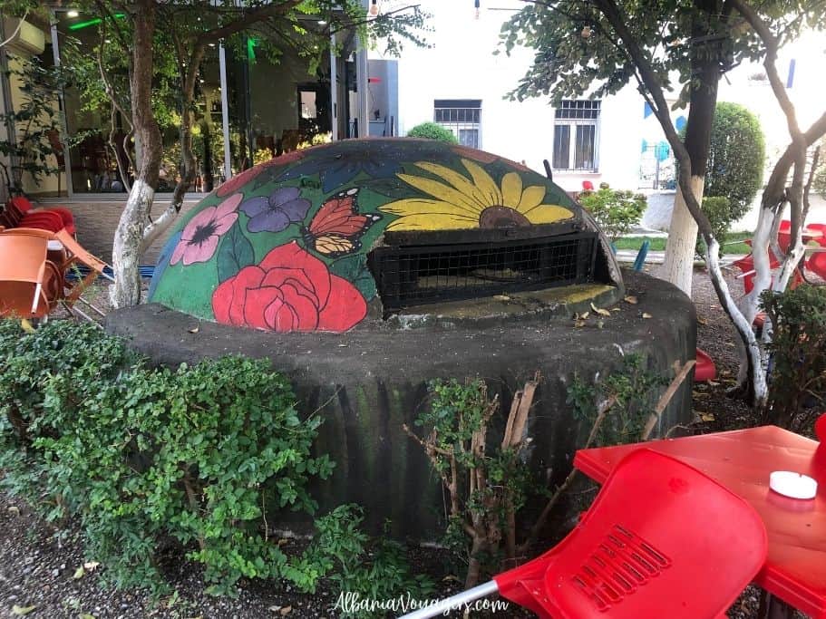 communist bunker painted in flowers adn butterflies in Shkoder