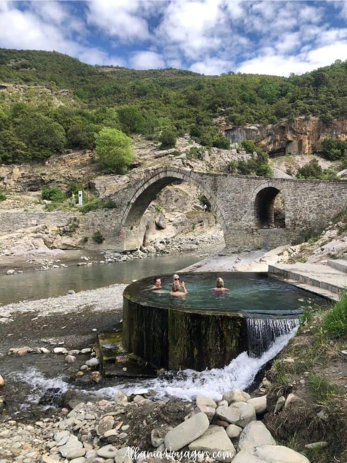 Benja hot springs with Ottoman era bridge behind